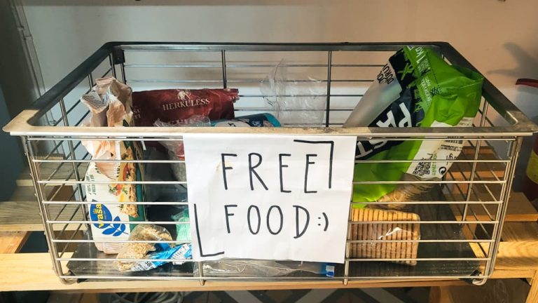 Free food sign at a hostel with some food stuffs.